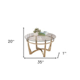 35" Clear And Champagne Glass And Metal Round Coffee Table