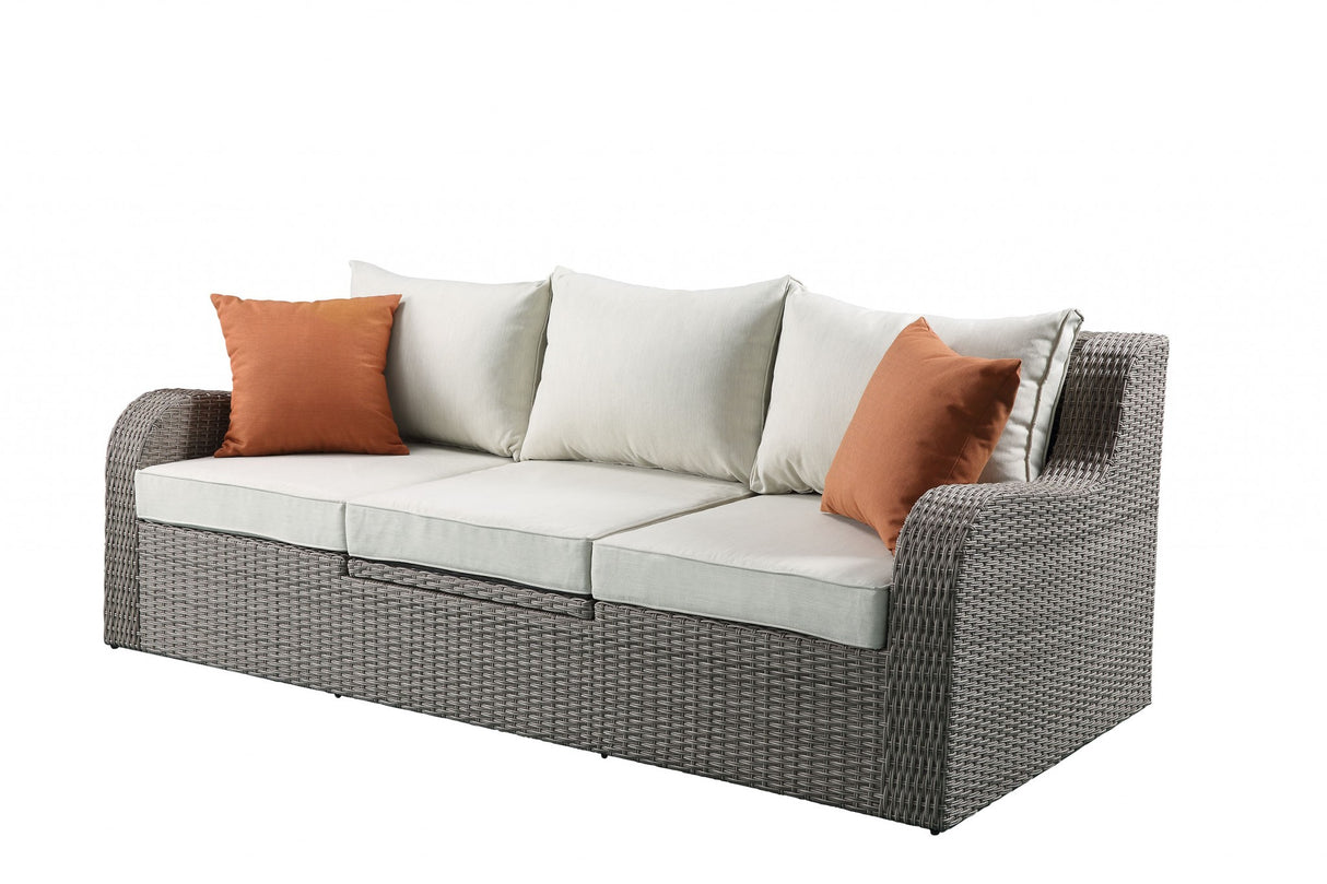 Three Piece Outdoor Gray Wicker Sectional Seating Group with Beige Cushions