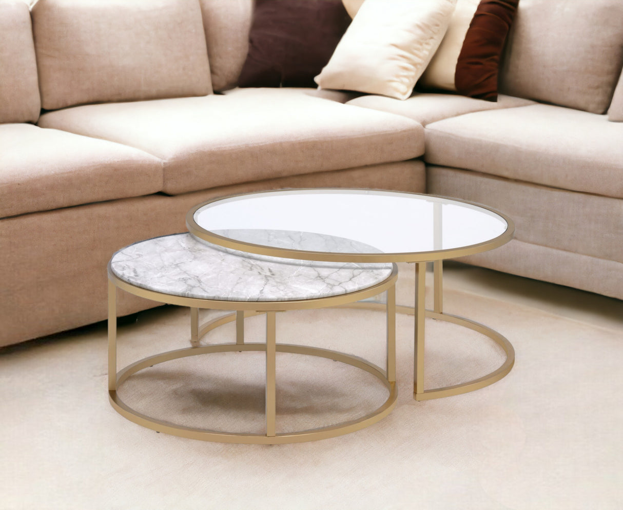 Set of Two 36" Clear White And Gold Glass Faux Marble And Iron Round Nested Coffee Tables