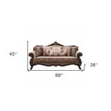 88" Beige Velvet Floral Sofa And Toss Pillows With Brown Legs