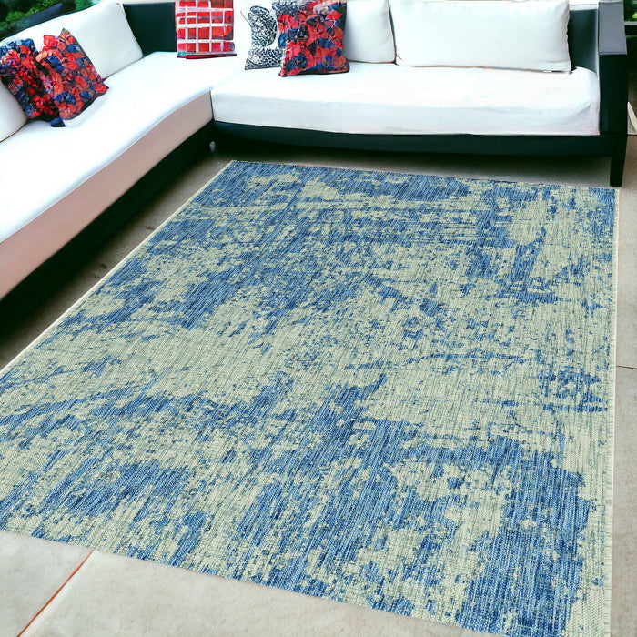 5' X 8' Blue and Green Abstract Indoor Outdoor Area Rug