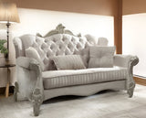 70" Bone And Gold Faux Leather Curved Loveseat