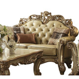 70" Bone And Gold Faux Leather Curved Loveseat