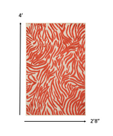 4' X 6' Orange And Ivory Abstract Stain Resistant Indoor Outdoor Area Rug