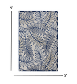 5' X 8' Ivory And Blue Floral Indoor Outdoor Area Rug