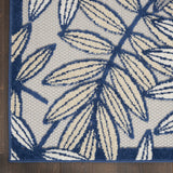 5' X 8' Ivory And Blue Floral Indoor Outdoor Area Rug