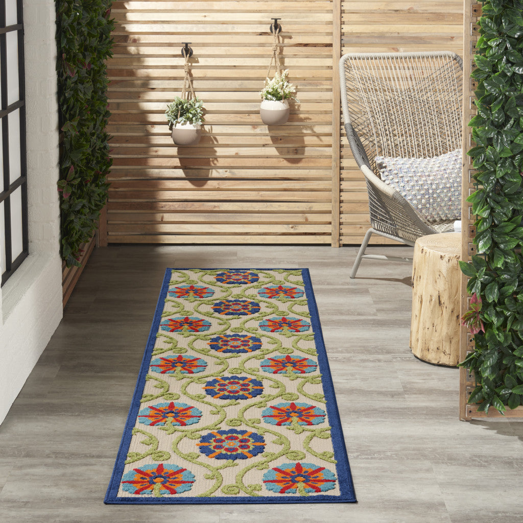 7' X 10' Ivory And Blue Floral Indoor Outdoor Area Rug