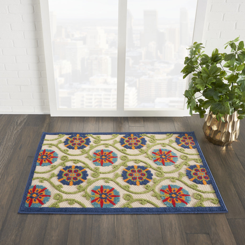 4' X 6' Ivory And Blue Floral Indoor Outdoor Area Rug