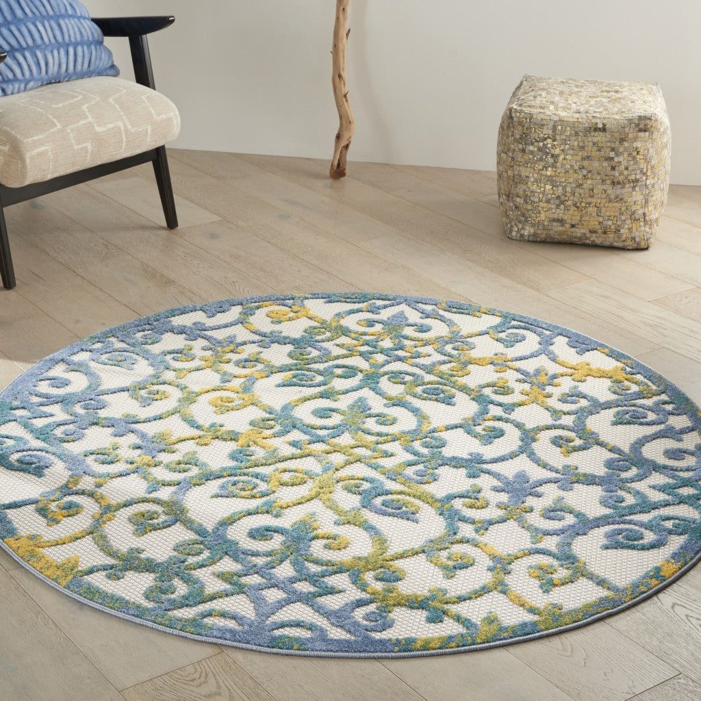 8' X 11' Ivory And Blue Floral Indoor Outdoor Area Rug