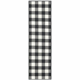 2' X 8' Black and Ivory Indoor Outdoor Area Rug