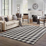 5' X 8' Black and Ivory Indoor Outdoor Area Rug