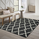 7' X 10' Black and Ivory Indoor Outdoor Area Rug