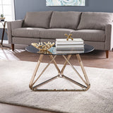 31" Champagne Glass And Metal Round Coffee Table