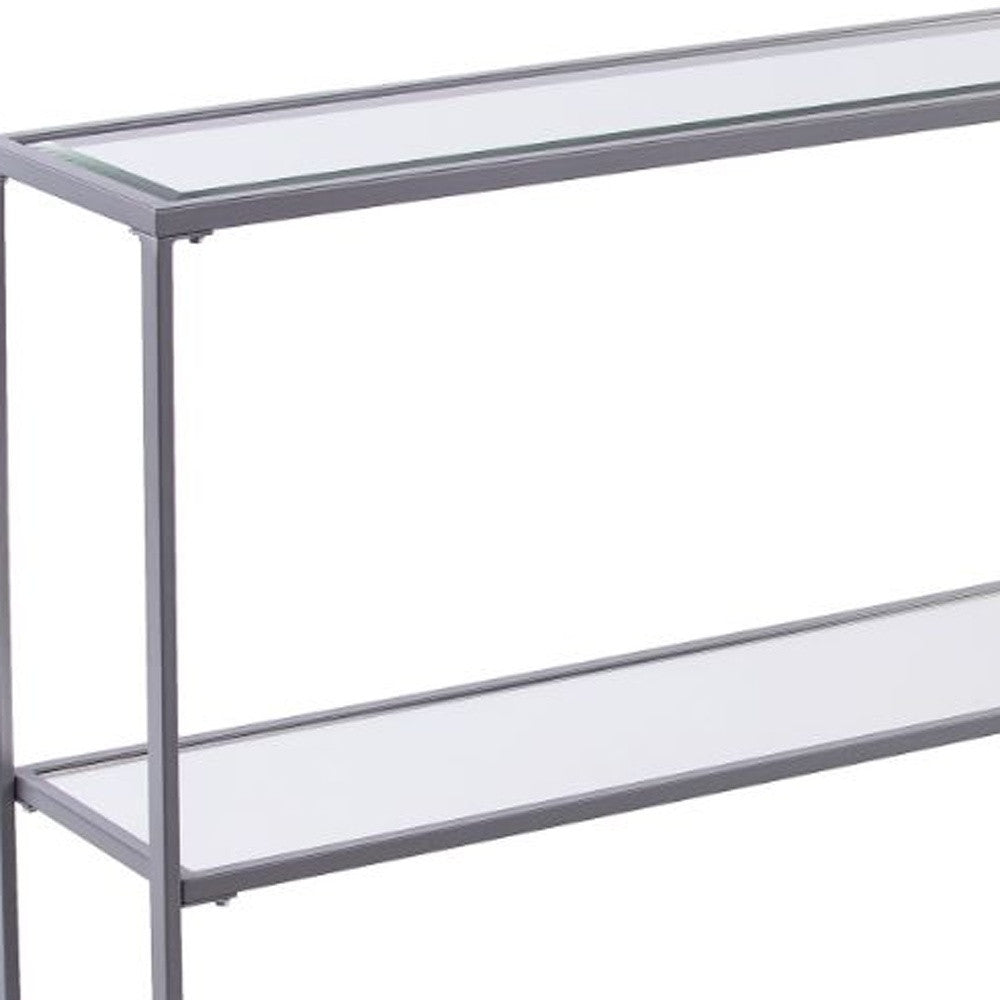 52" Clear and Silver Glass Sled Console Table With Shelves