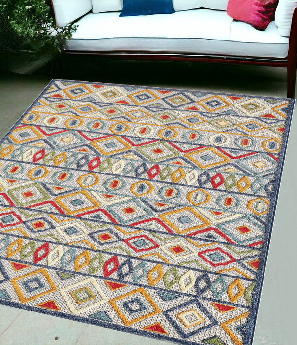 5' X 7' Ivory And Blue Southwestern Stain Resistant Indoor Outdoor Area Rug