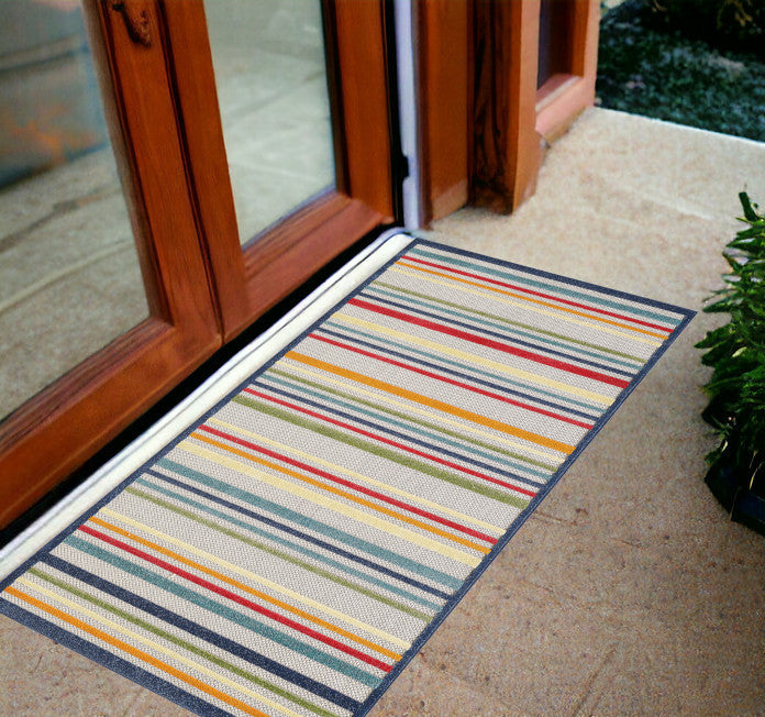 2' X 4' Ivory And Blue Striped Stain Resistant Indoor Outdoor Area Rug