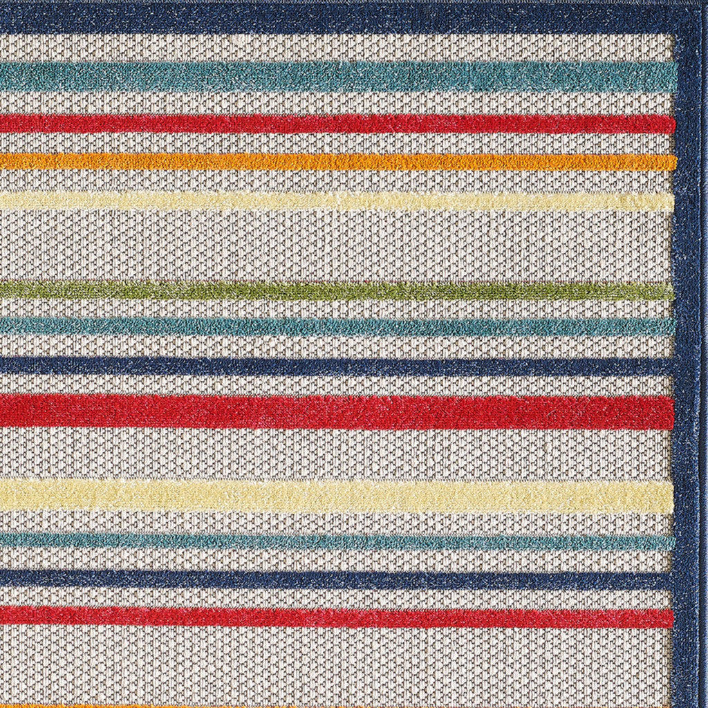 2' X 4' Ivory And Blue Striped Stain Resistant Indoor Outdoor Area Rug