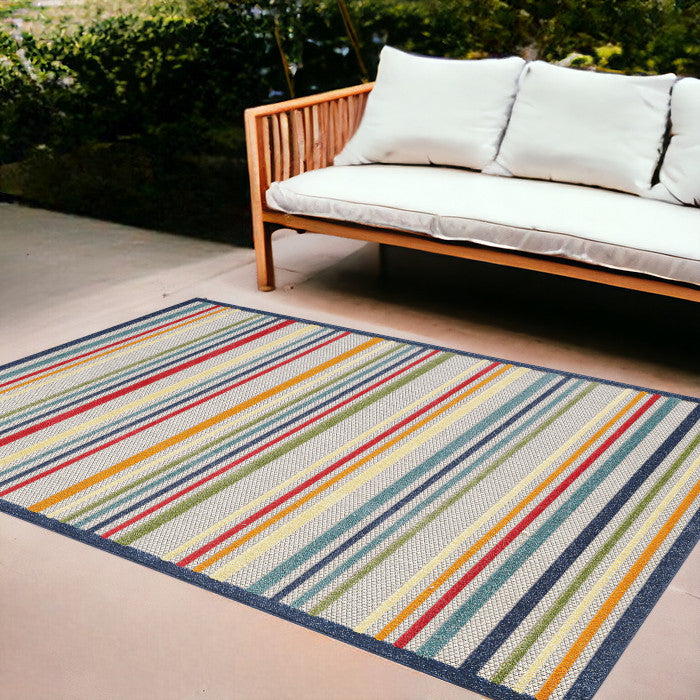 8' X 10' Ivory And Blue Striped Stain Resistant Indoor Outdoor Area Rug