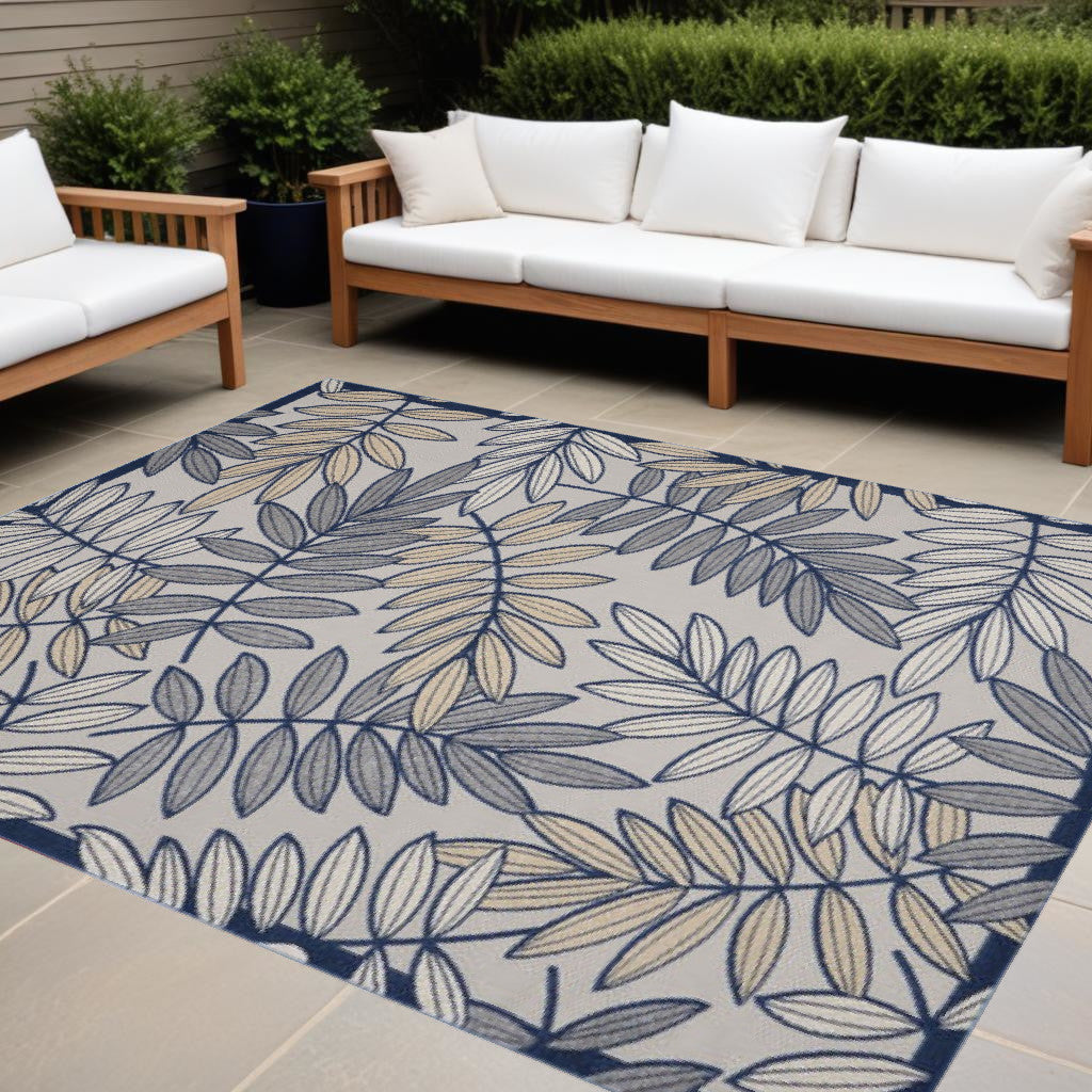 10' X 13' Ivory And Navy Floral Non Skid Indoor Outdoor Area Rug