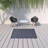 5' X 7' Navy Blue Ikat Indoor Outdoor Area Rug