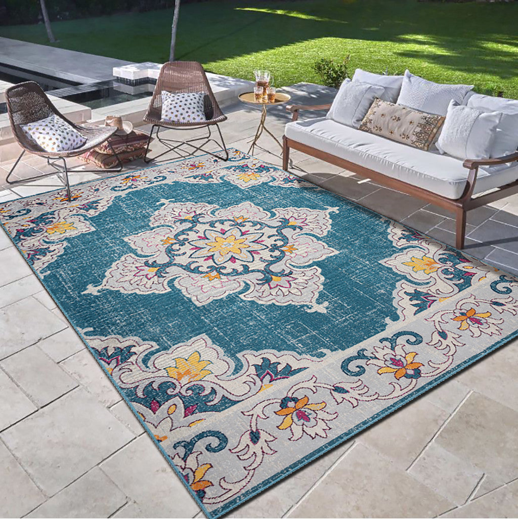 5' X 8' Blue And Ivory Floral Stain Resistant Indoor Outdoor Area Rug