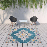 8' X 10' Blue And Ivory Floral Stain Resistant Indoor Outdoor Area Rug