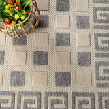 6' X 9' Cream Geometric Stain Resistant Non Skid Indoor Outdoor Area Rug