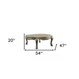 54" Gold And Bone Solid And Manufactured Wood Coffee Table