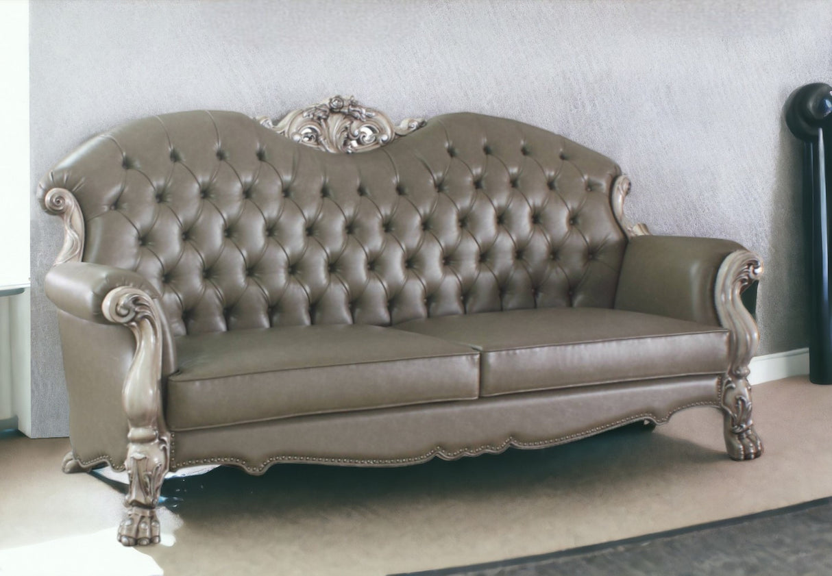 96" Bone Faux Leather Sofa And Toss Pillows With White Legs