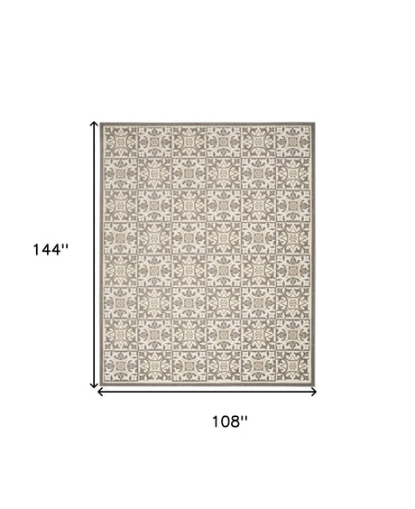 9' X 12' Ivory And Grey Fleur De Lis Stain Resistant Non Skid Area Rug