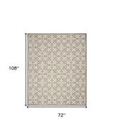 6' X 9' Ivory And Grey Fleur De Lis Stain Resistant Non Skid Area Rug