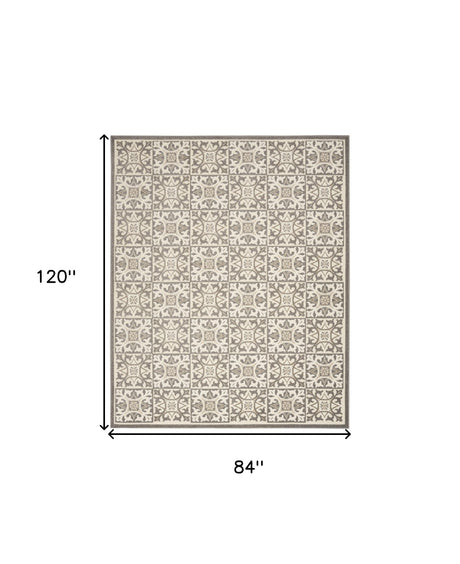 7' X 10' Ivory And Grey Fleur De Lis Stain Resistant Non Skid Area Rug