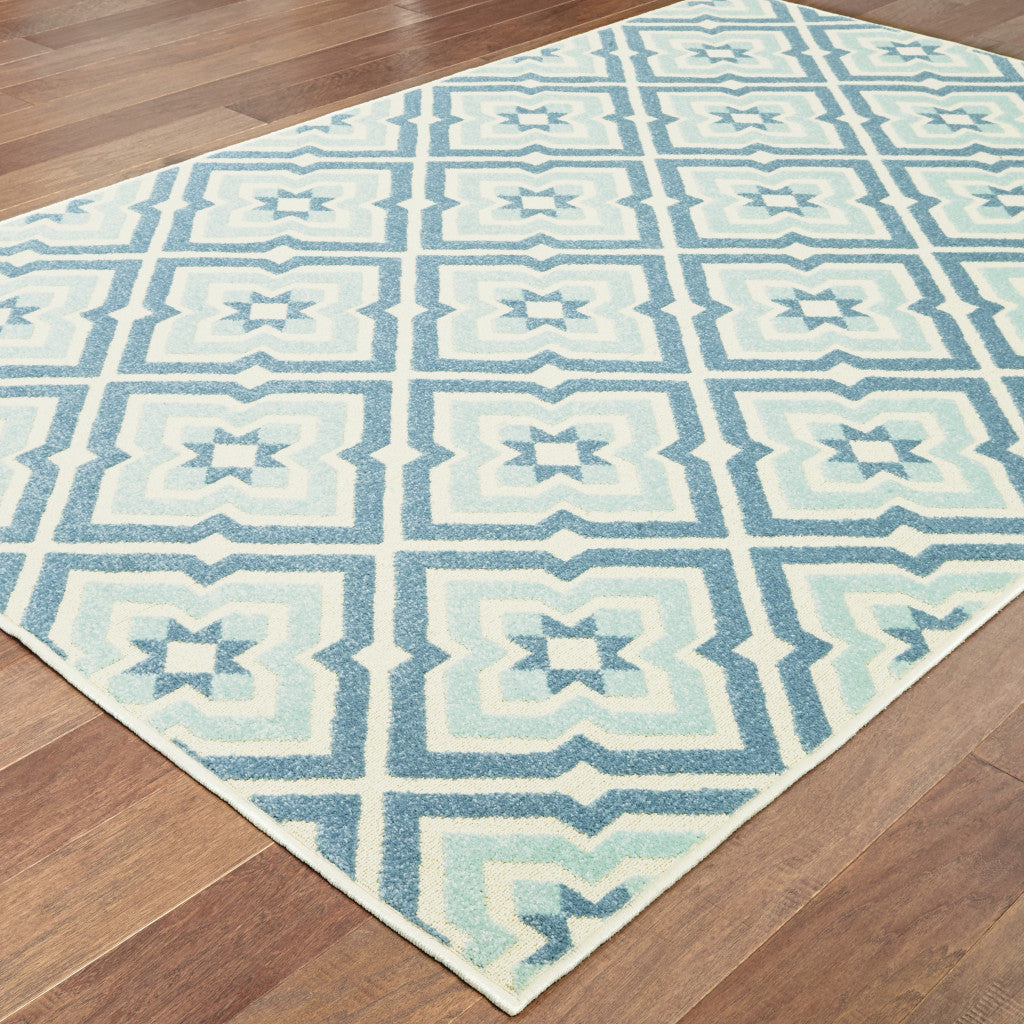 10' X 13' Blue and Ivory Geometric Stain Resistant Indoor Outdoor Area Rug