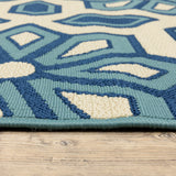 2' X 4' Ivory and Blue Geometric Stain Resistant Indoor Outdoor Area Rug