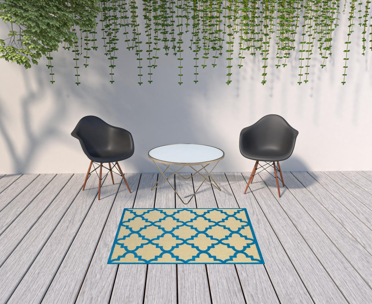 4' X 5' Blue and Beige Geometric Stain Resistant Indoor Outdoor Area Rug