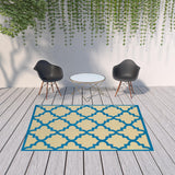 7' X 10' Blue and Beige Geometric Stain Resistant Indoor Outdoor Area Rug