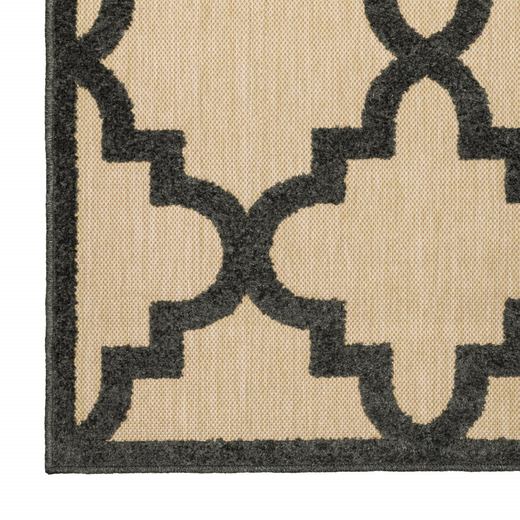 2' X 8' Beige and Black Geometric Stain Resistant Indoor Outdoor Area Rug