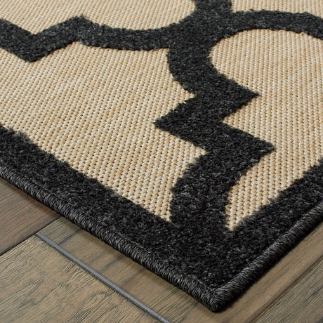 5' X 8' Beige and Black Geometric Stain Resistant Indoor Outdoor Area Rug