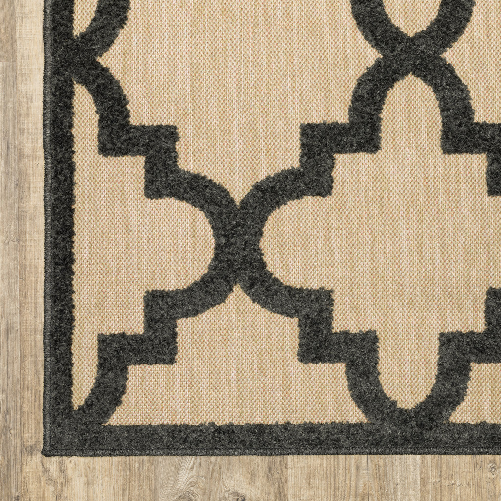 5' X 8' Beige and Black Geometric Stain Resistant Indoor Outdoor Area Rug