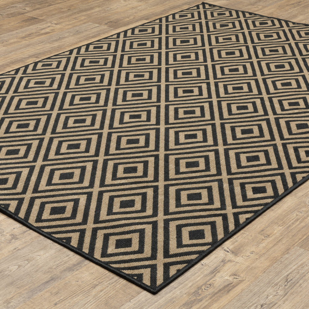 2' X 4' Black and Tan Geometric Stain Resistant Indoor Outdoor Area Rug