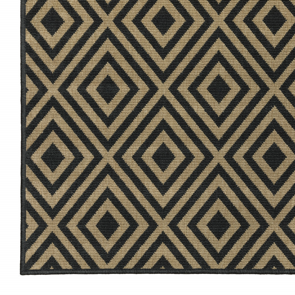 2' X 8' Black and Tan Geometric Stain Resistant Indoor Outdoor Area Rug