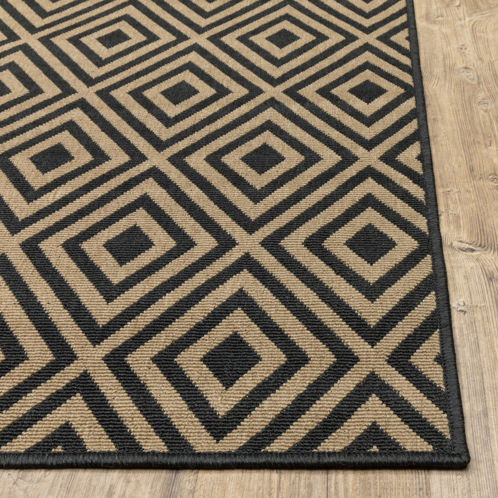 2' X 8' Black and Tan Geometric Stain Resistant Indoor Outdoor Area Rug