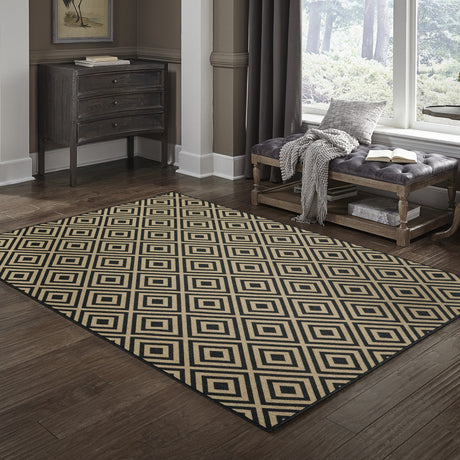 5' X 8' Black and Tan Geometric Stain Resistant Indoor Outdoor Area Rug