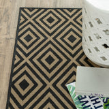 5' X 8' Black and Tan Geometric Stain Resistant Indoor Outdoor Area Rug