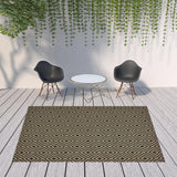 8' X 11' Black and Tan Geometric Stain Resistant Indoor Outdoor Area Rug