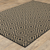 9' X 13' Black and Tan Geometric Stain Resistant Indoor Outdoor Area Rug