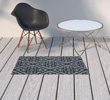 2' X 4' Blue and Ivory Geometric Stain Resistant Indoor Outdoor Area Rug