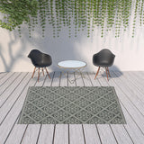 7' X 10' Gray and Ivory Geometric Stain Resistant Indoor Outdoor Area Rug