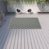 9' X 13' Gray and Ivory Geometric Stain Resistant Indoor Outdoor Area Rug