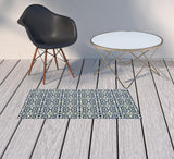 2' X 4' Ivory and Blue Geometric Stain Resistant Indoor Outdoor Area Rug